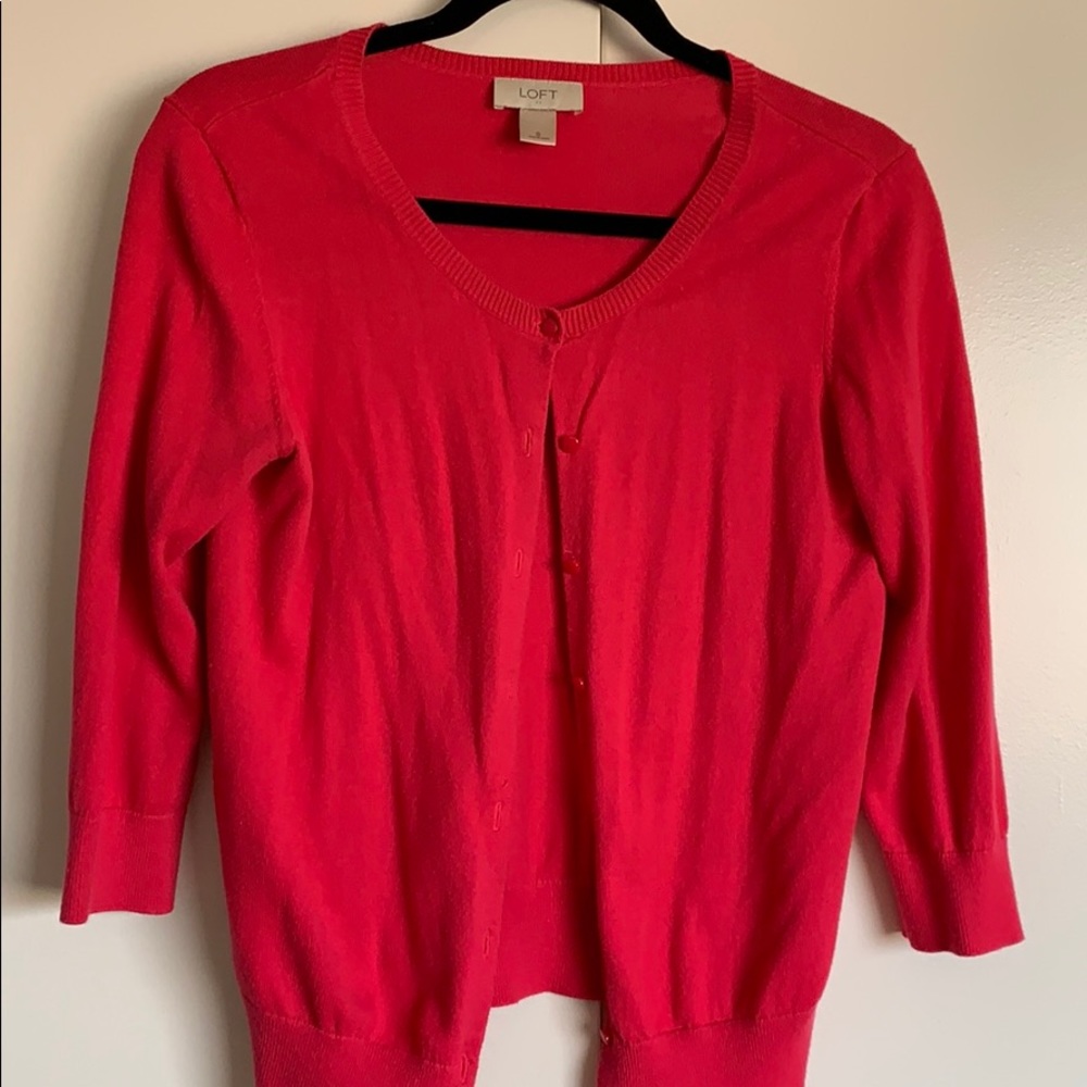 Bright pink cardigan